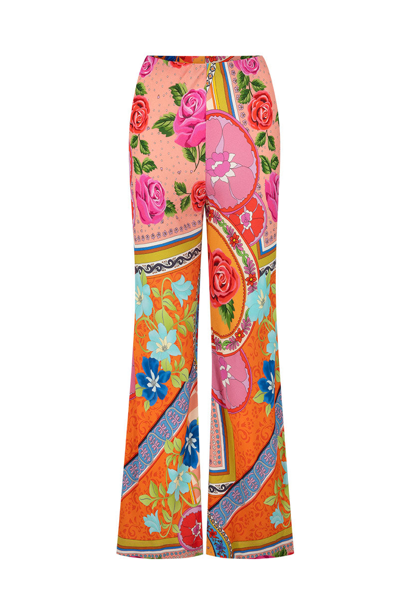 Colorful patterned pants with floral and abstract designs on a white background