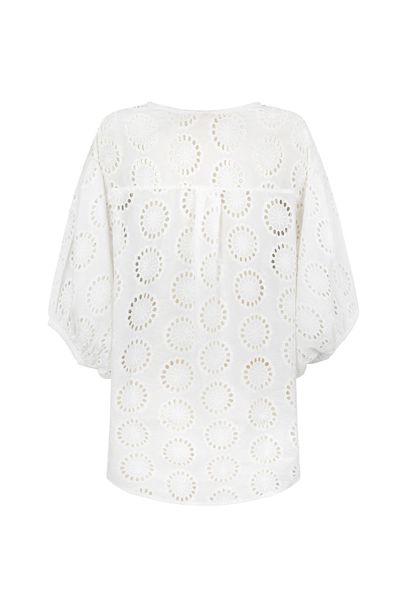 White lace top on a white background