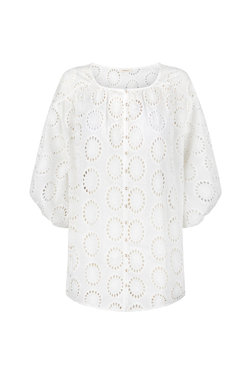White lace blouse on a white background
