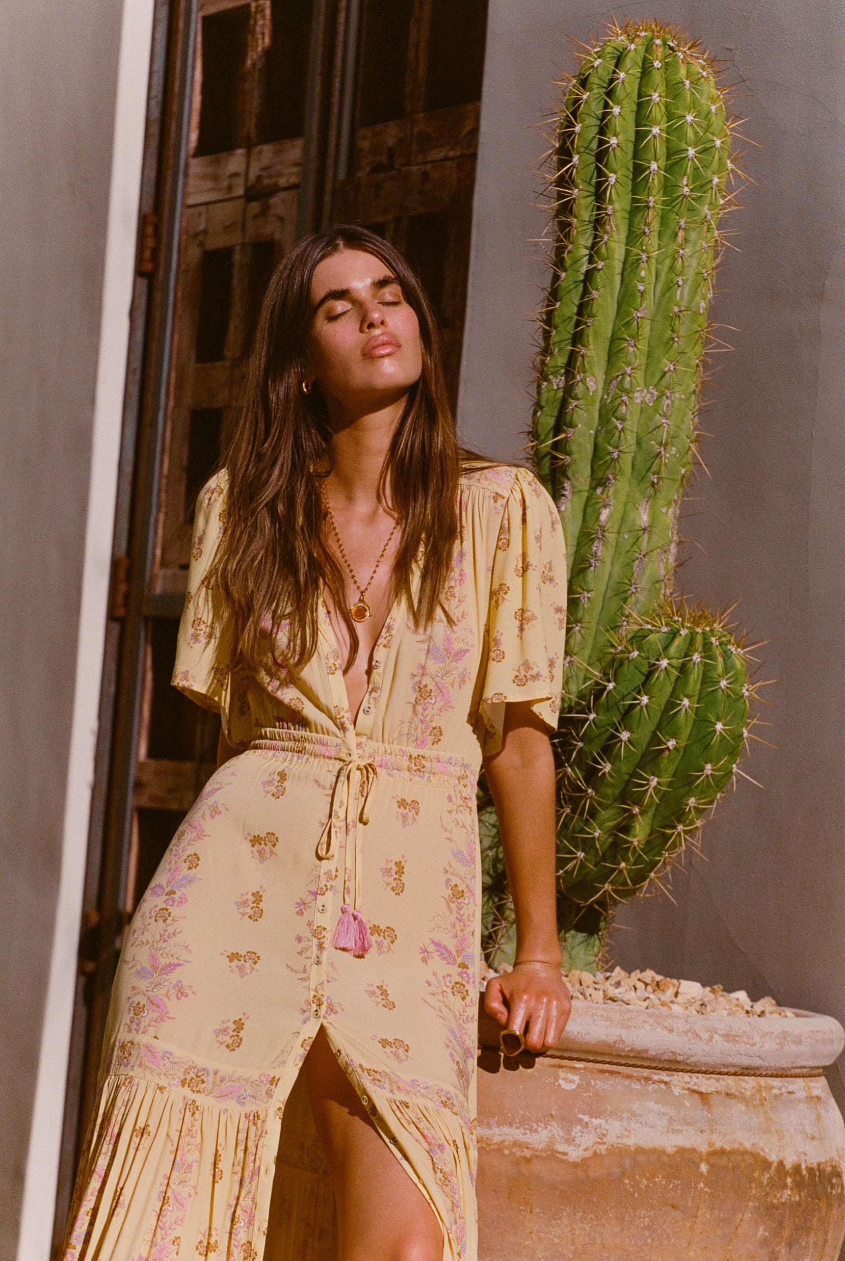 Yellow floral maxi dress with button through details and elasticated ties