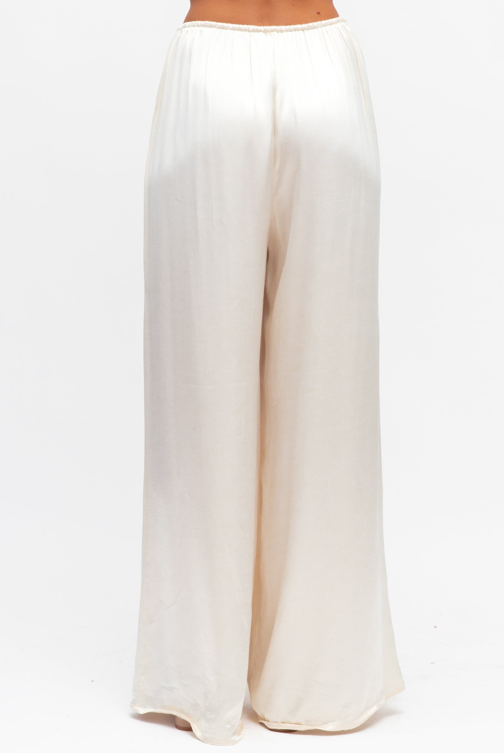 White wide-leg pants on a white background