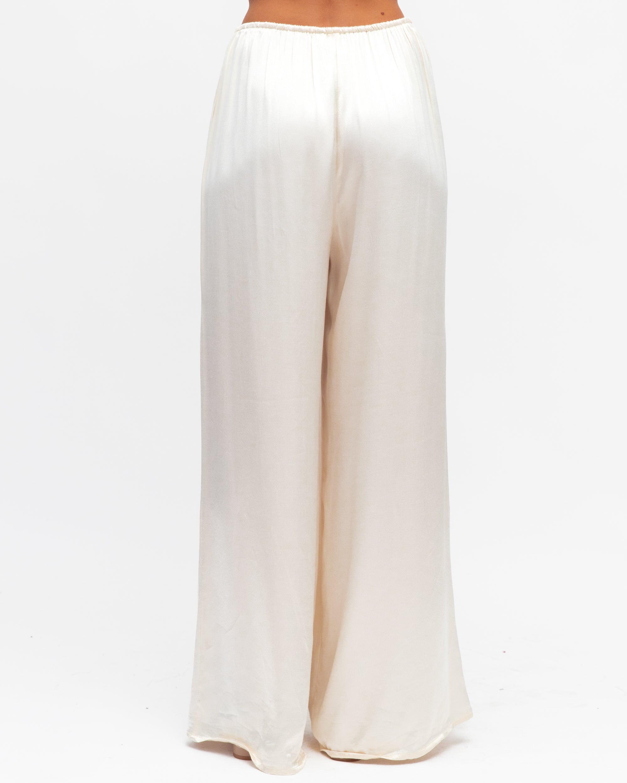 White wide-leg pants on a white background