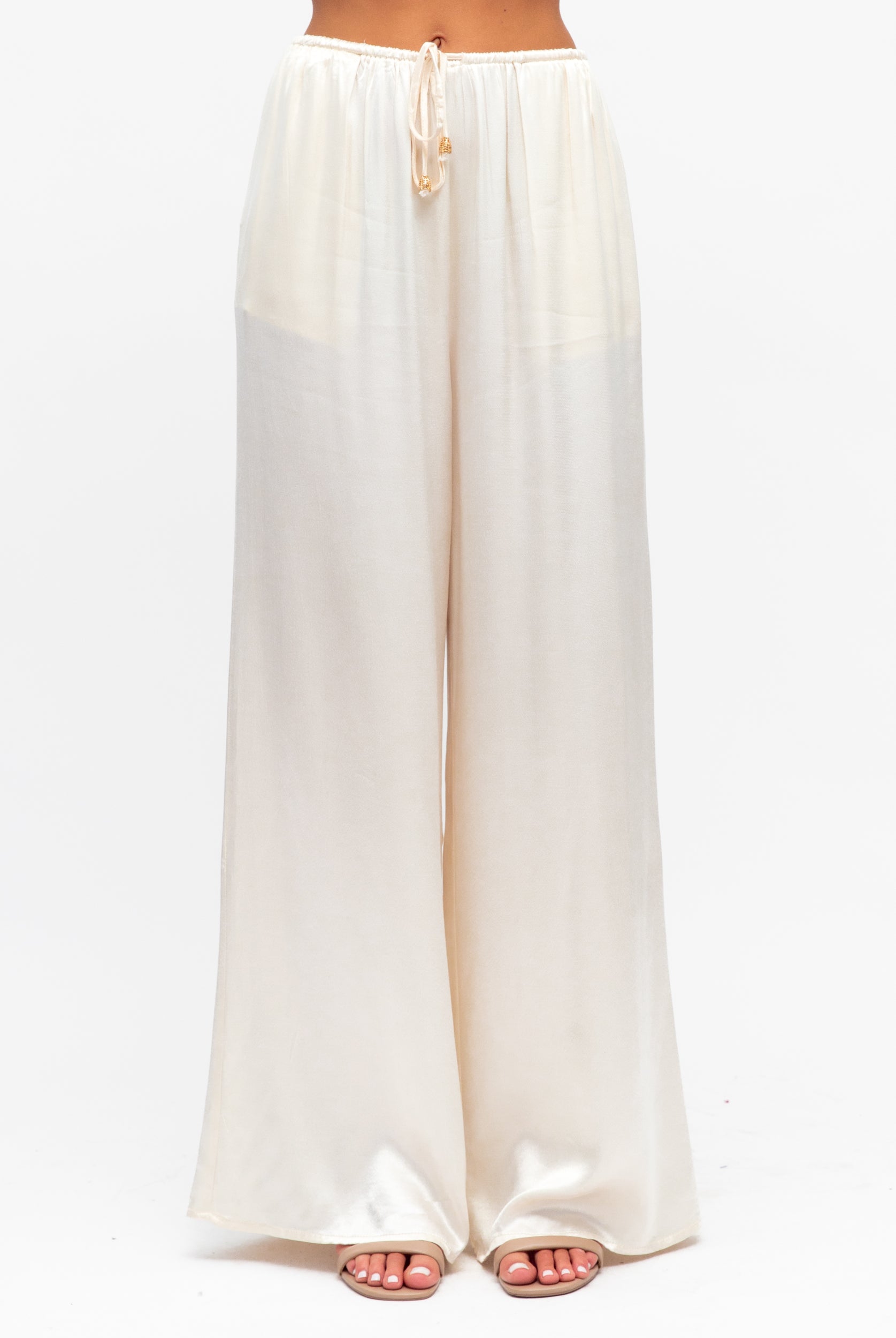 White wide-leg pants on a white background