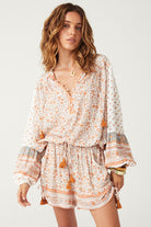 Sunshine Bandit Blouse in Desert Sage paired with blue wash jeans