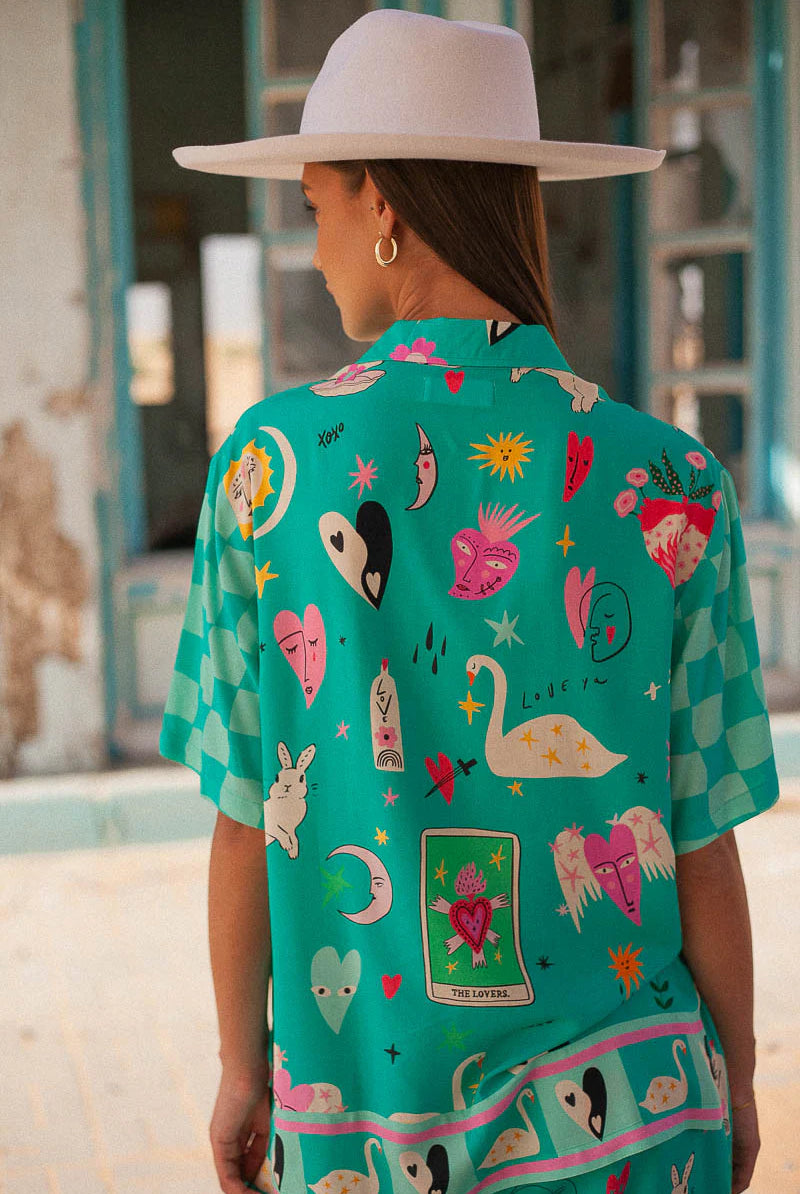 Turquoise short sleeve blouse with motif print in eco rayon