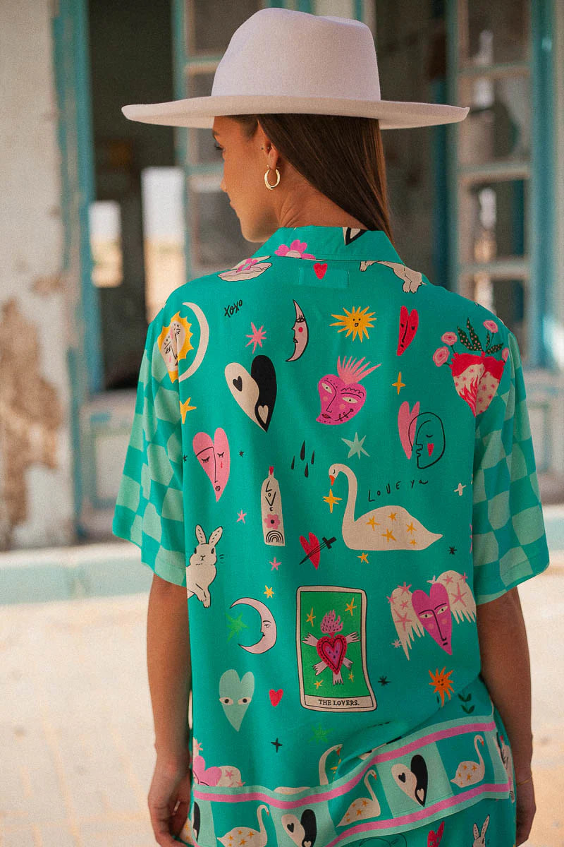 Turquoise short sleeve blouse with motif print in eco rayon