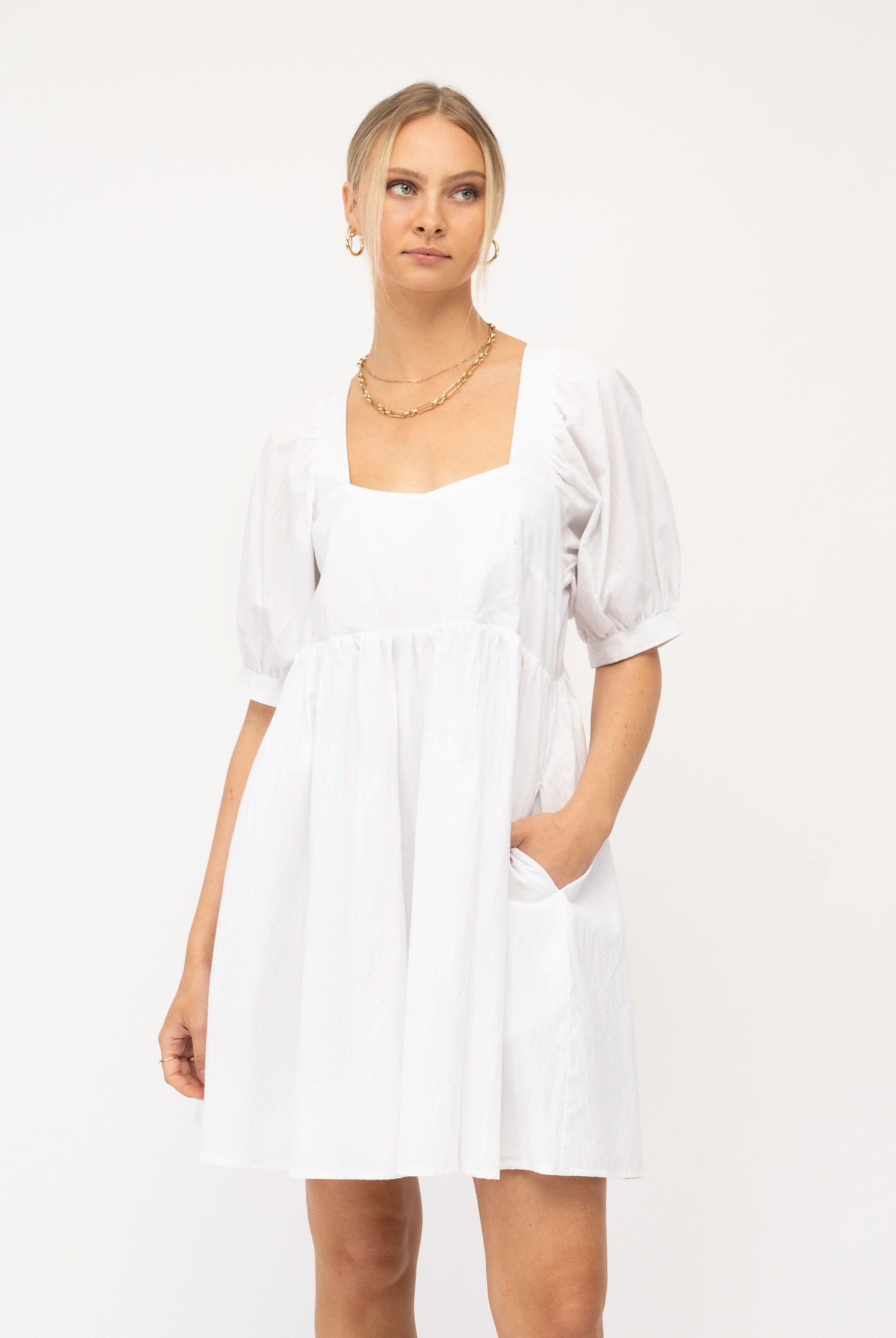 Model wearing Paper Heart white Sonia dress with pockets