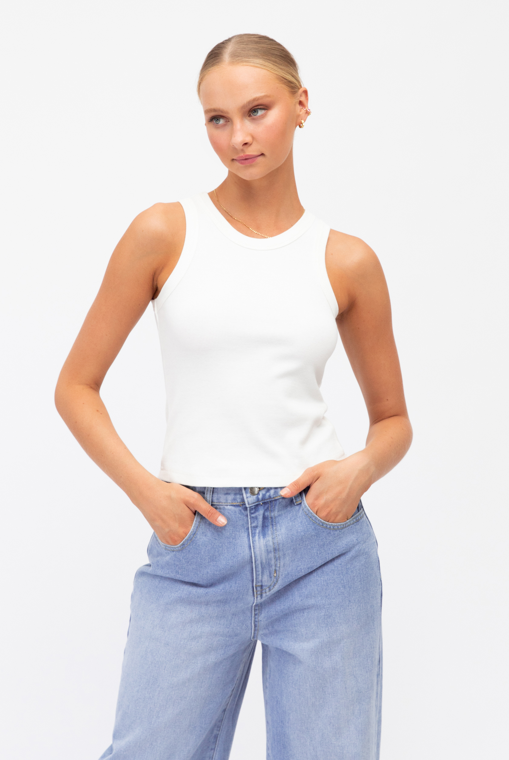 Model wearing the Paper Heart Summer tank in white