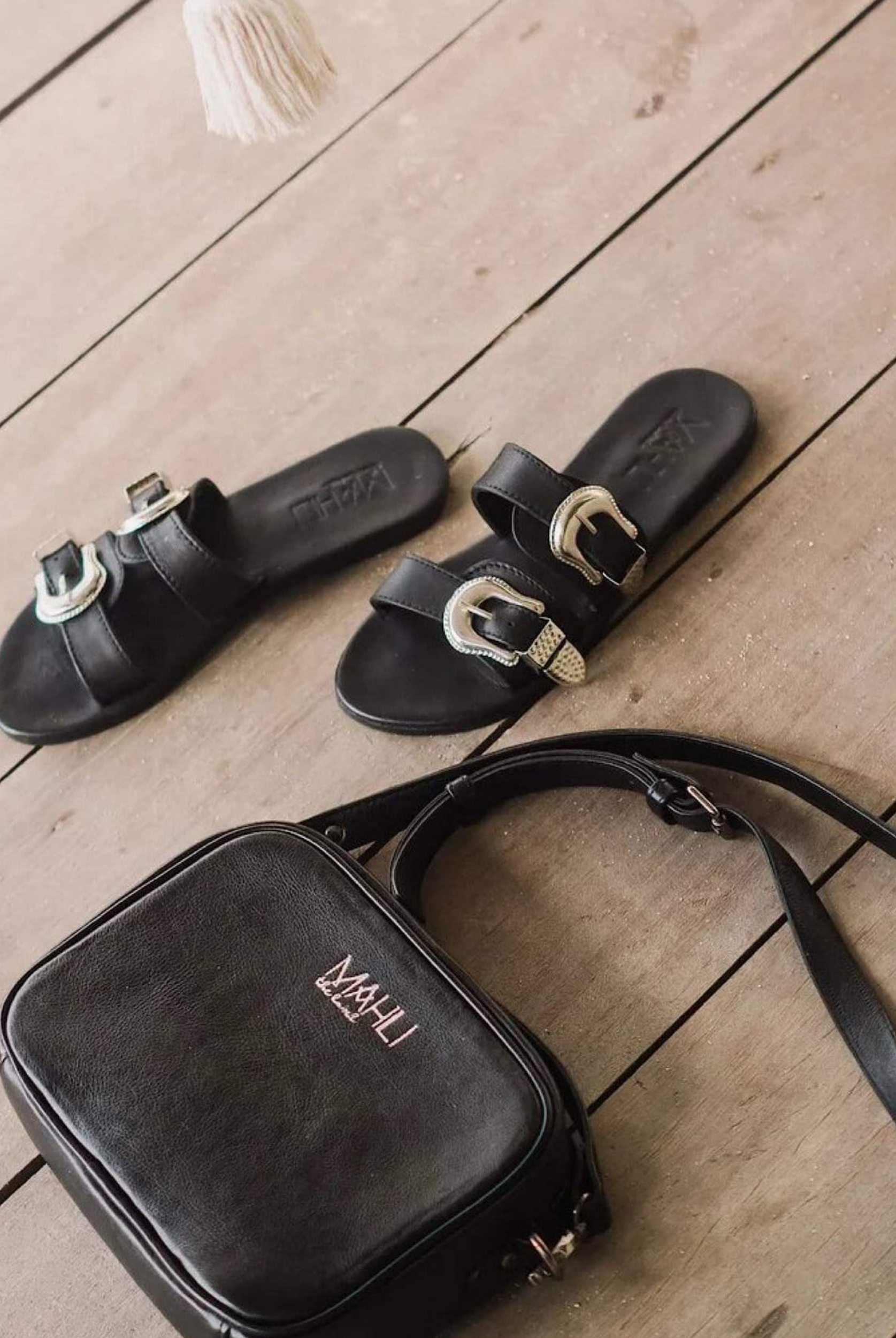 Model wearing the texan buckle slides