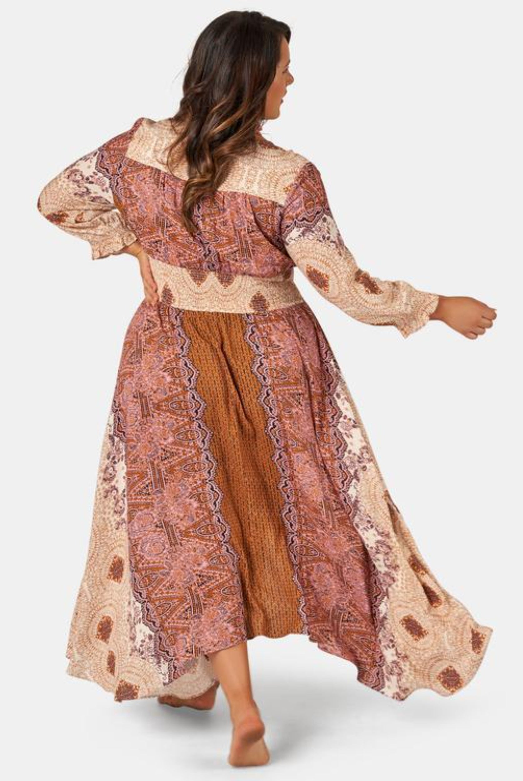 Model wearing the brown sugar maxi dress