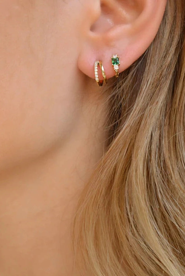 The Carla hoop in a models ear with the liz sleeper