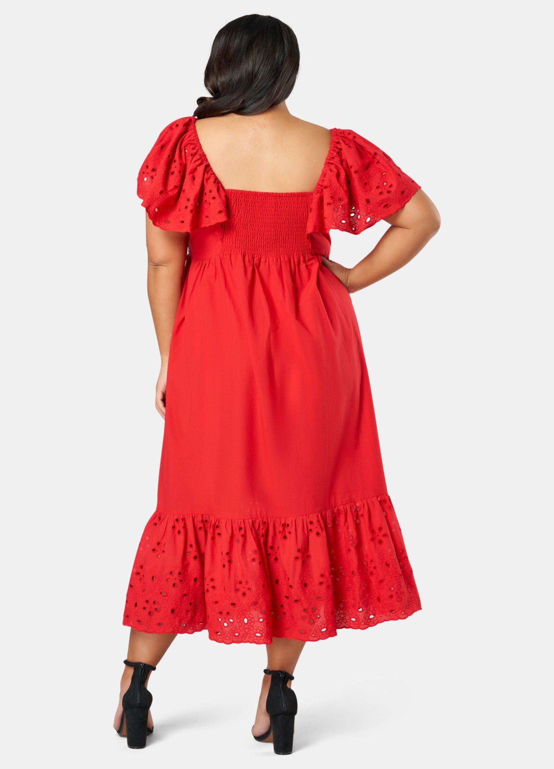 Model wearing red dress from back