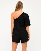 Black cotton one shoulder top with elastic cuff and shoulder detai