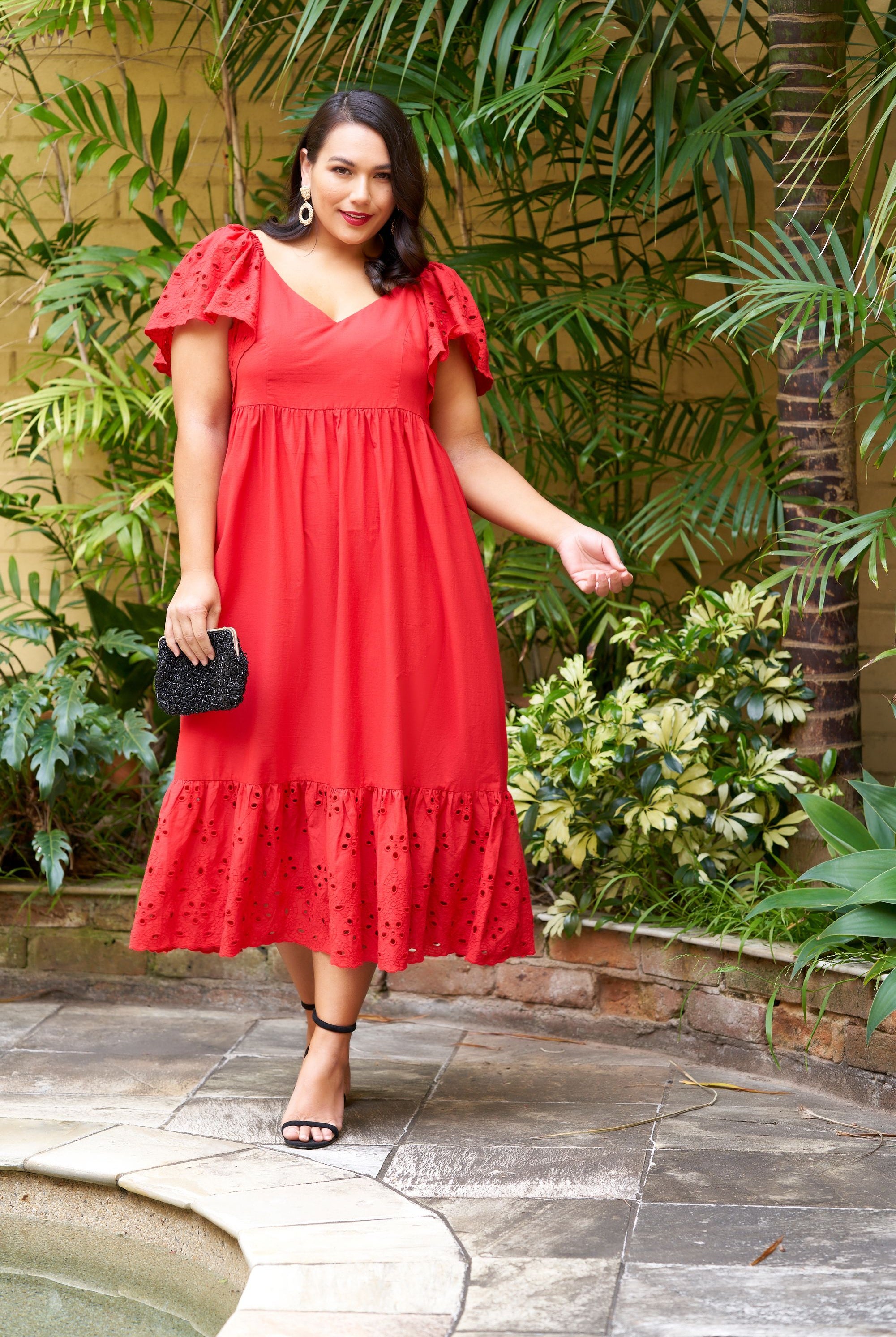 Model wearing red dress