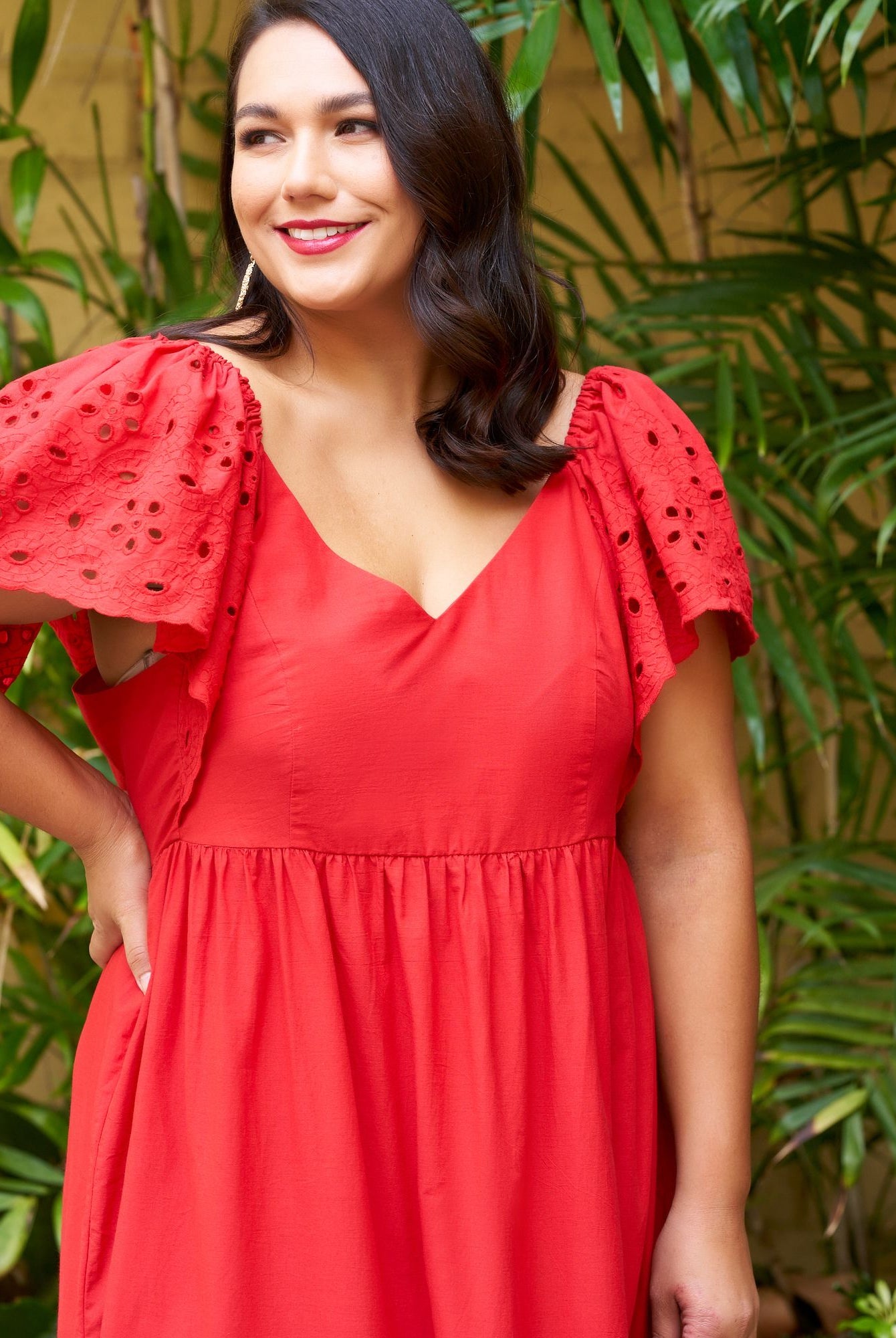 Model wearing red dress