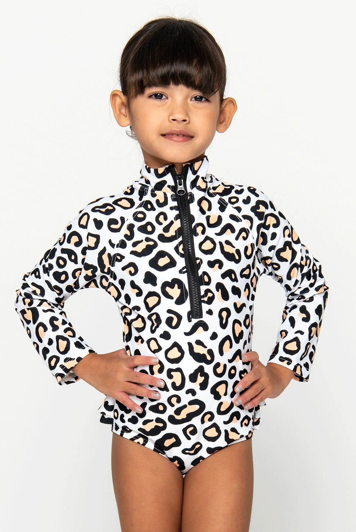 Mini Model wearing the Safari animal surf suit