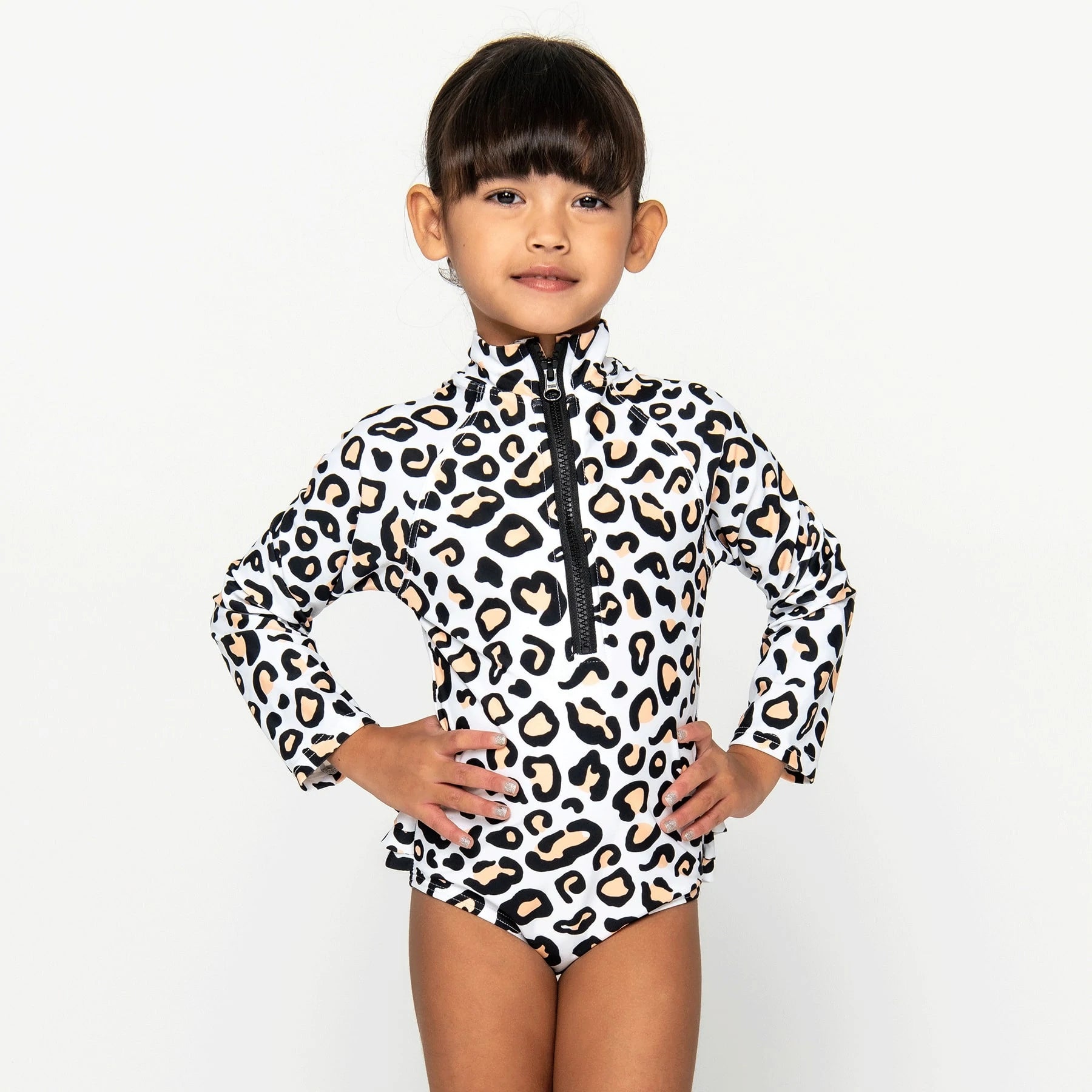 Mini Model wearing the Safari animal surf suit