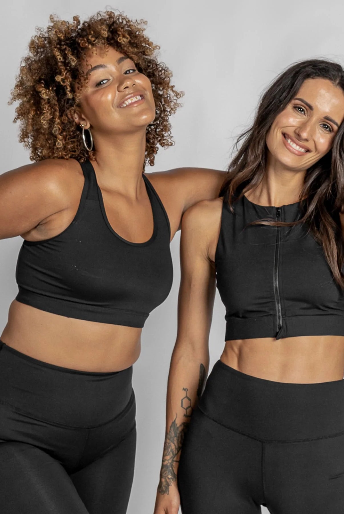 Black active crop top with centre front zip from Infamous Active