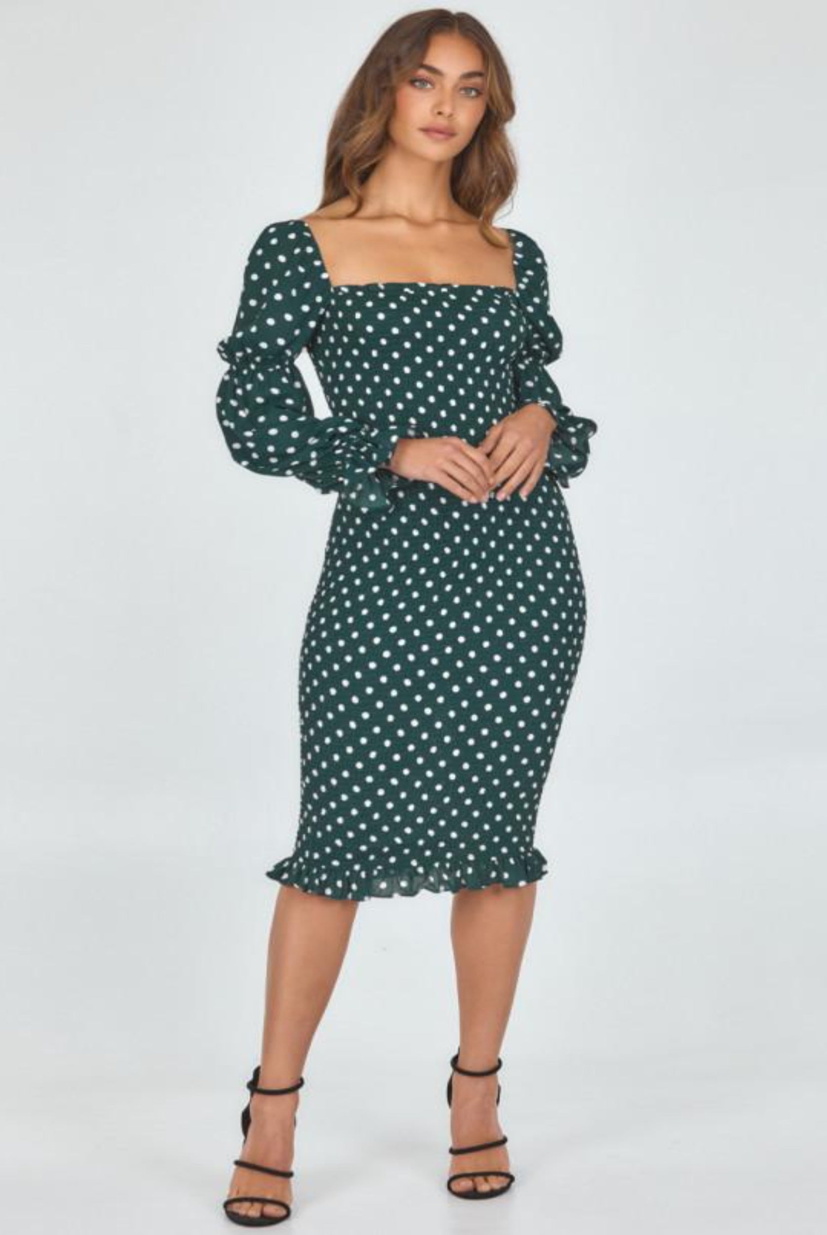 Model wearing dot print dress