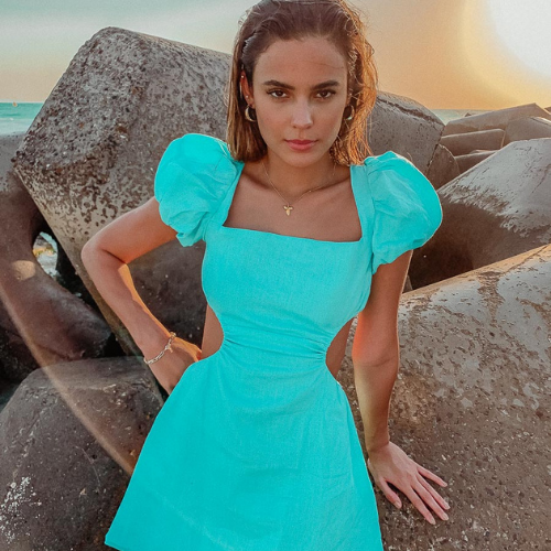 A petite model wearing the Amaretta Dress