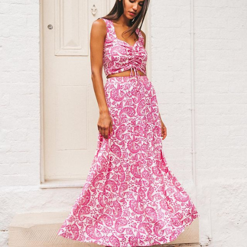 Model in pink paisley skirt