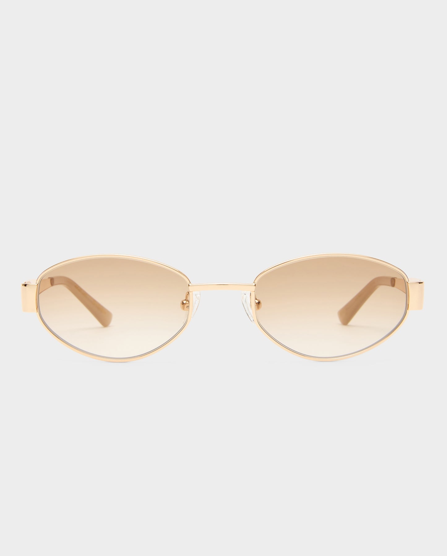 Gold-framed sunglasses with gold lenses on a white background
