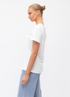 White tee with pocket detail on front from Paper Heart