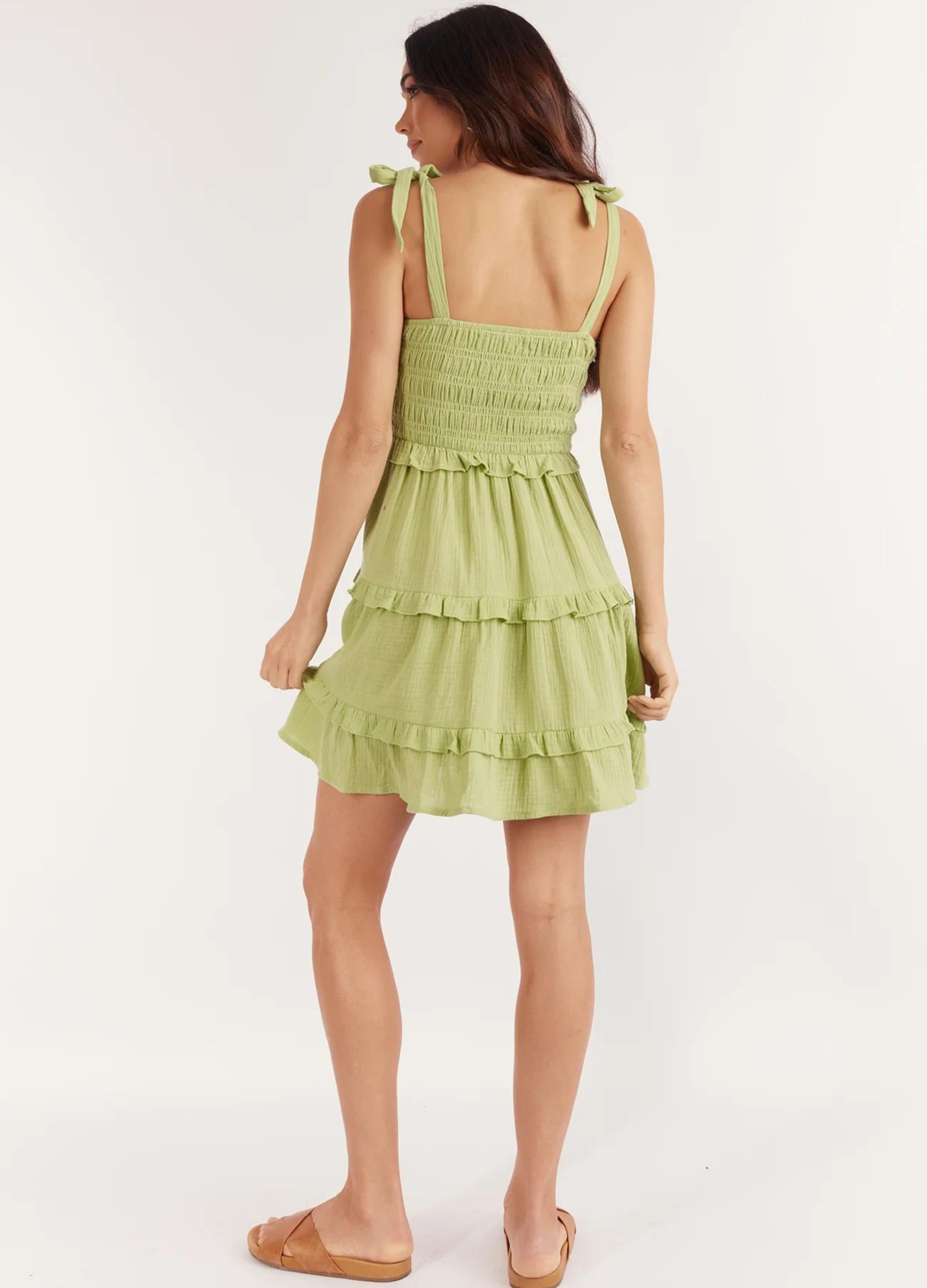 Strappy pale green mini dress with tie shoulders