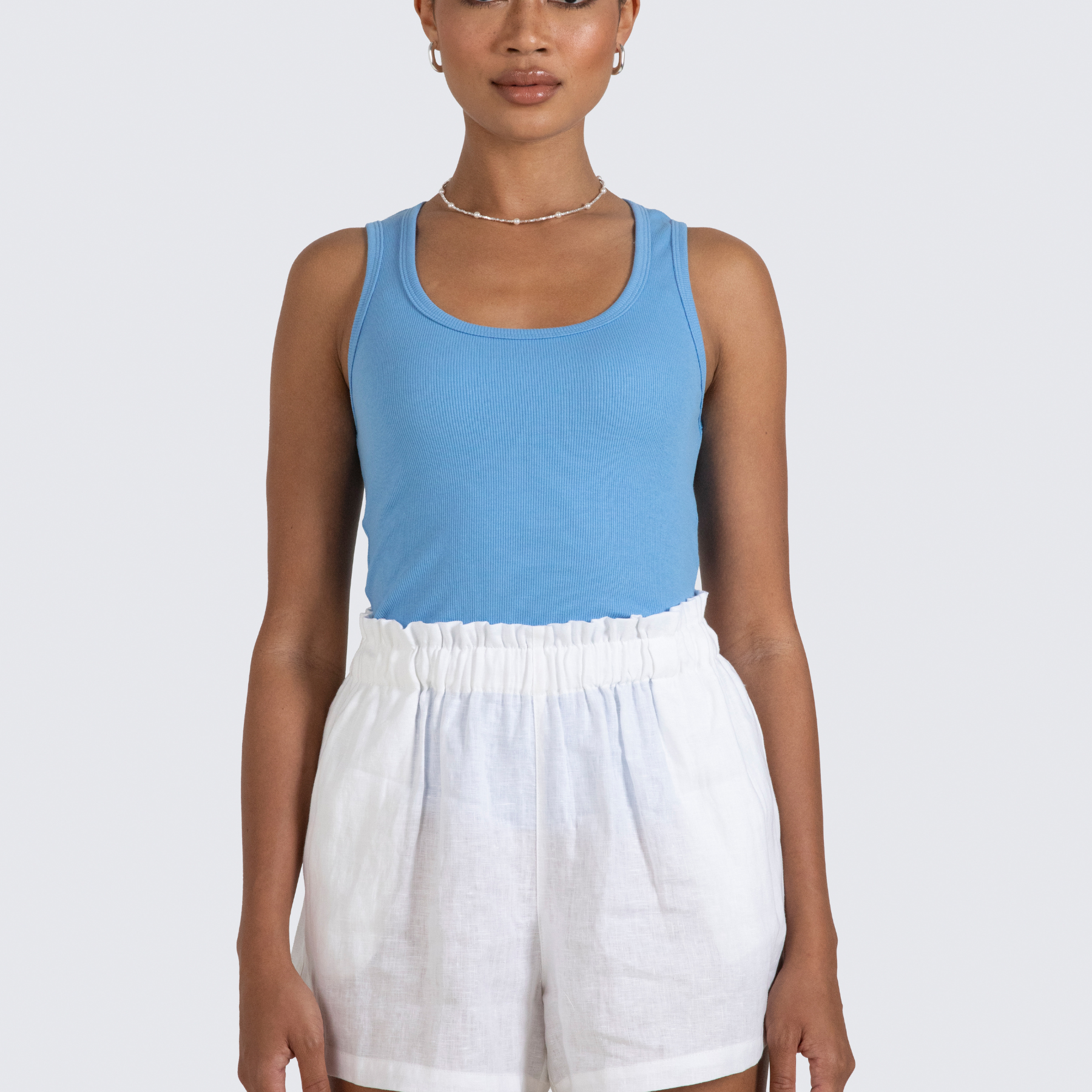 Sammy white linen shorts with elasticated waist and pockets