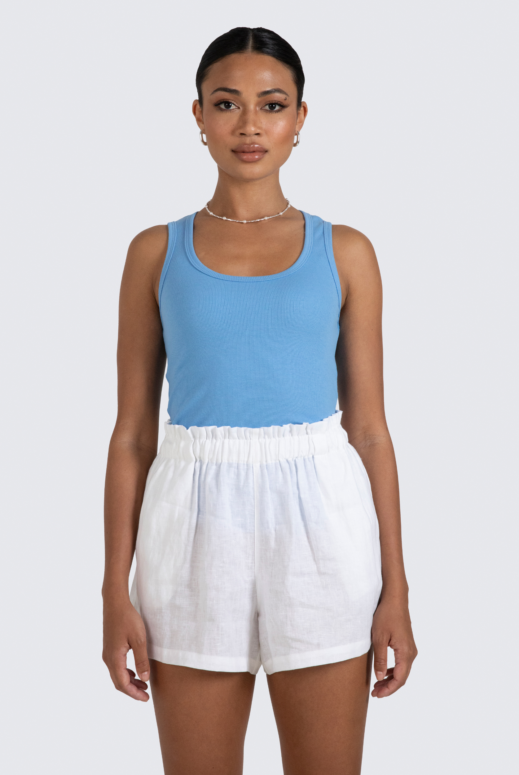 Sammy white linen shorts with elasticated waist and pockets