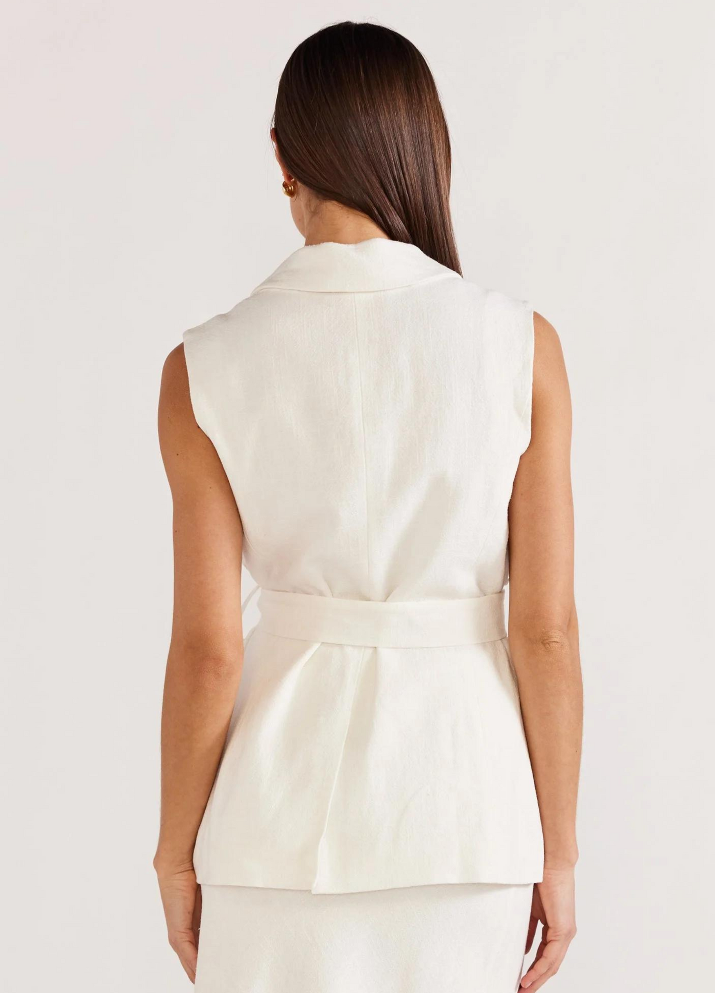 Sleeveless button up white blazer from Staple the Label