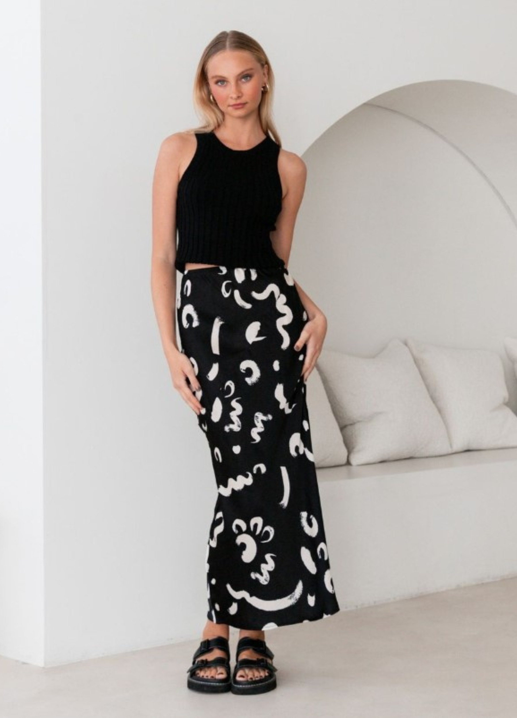 Model wearing the Kyria Skirt from Paper Heart in black and white print