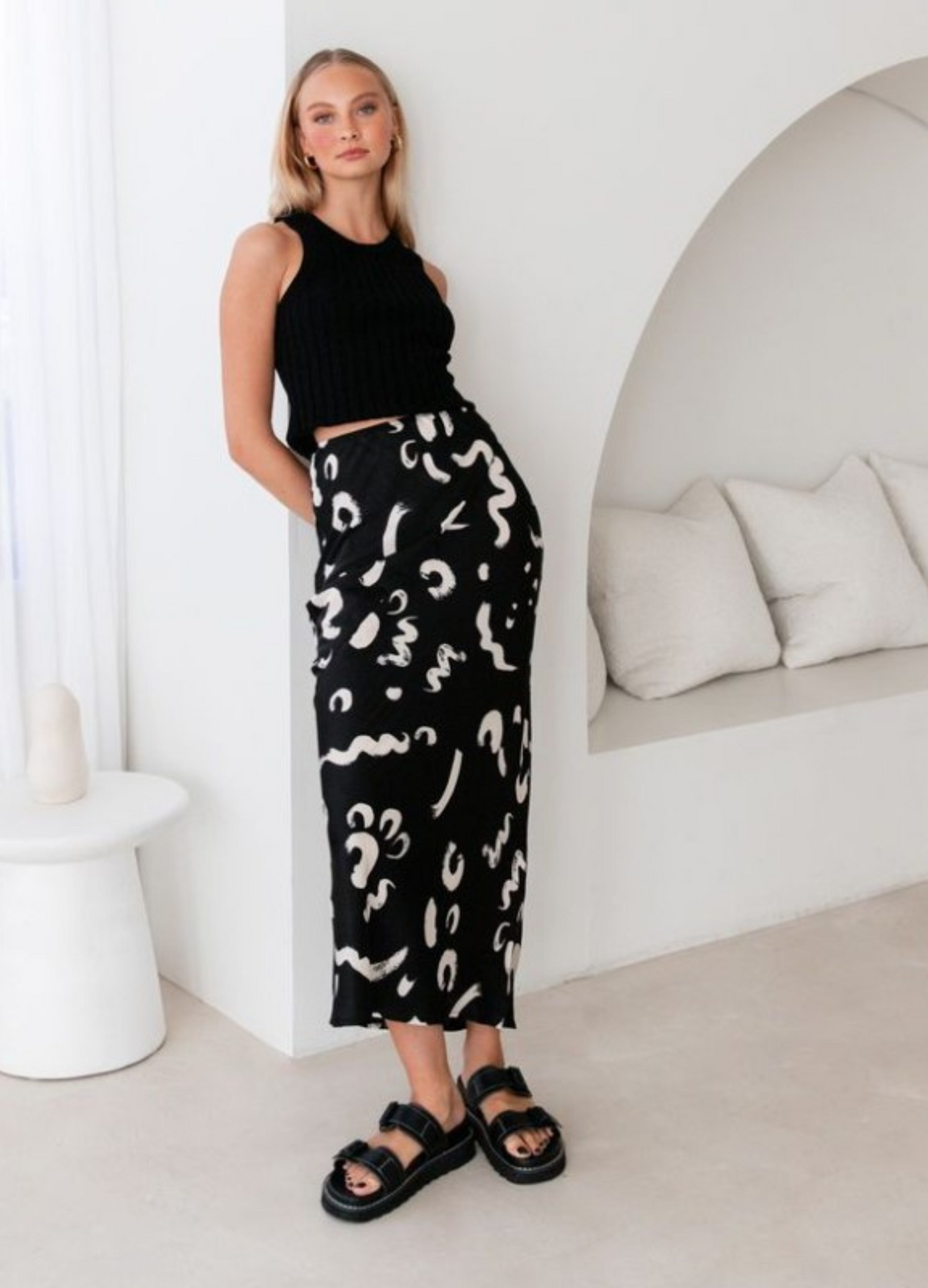 Model wearing the Kyria Skirt from Paper Heart in black and white print