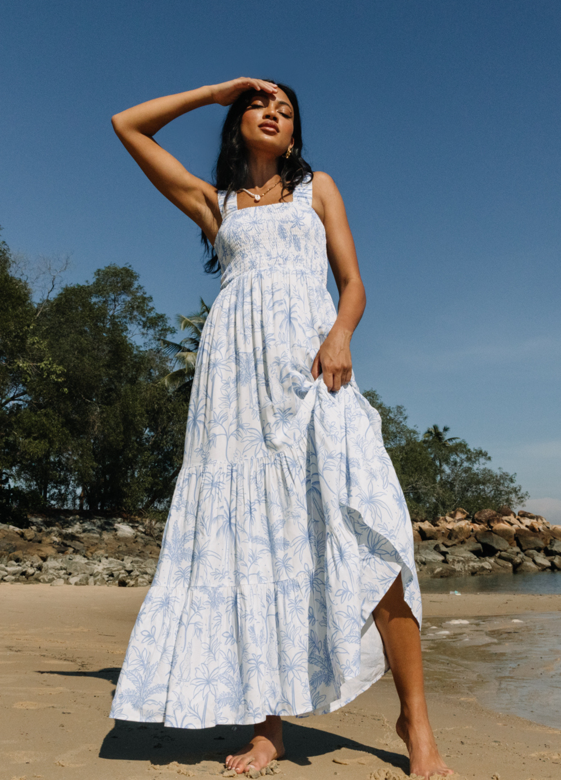Blue and white printed maxi dress with tropical palm tree print in breathable viscose fabric