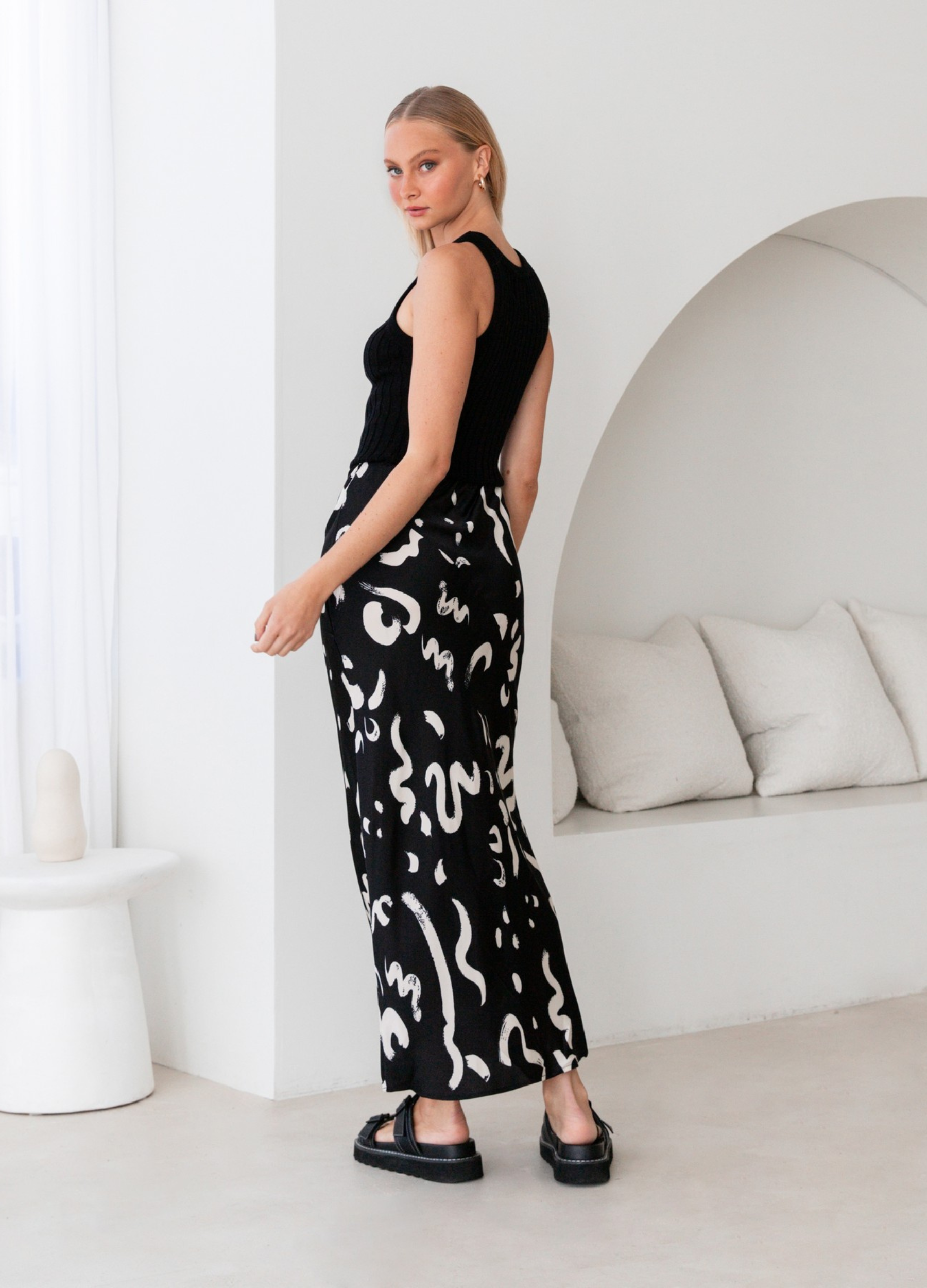 Model wearing the Kyria Skirt from Paper Heart in black and white print