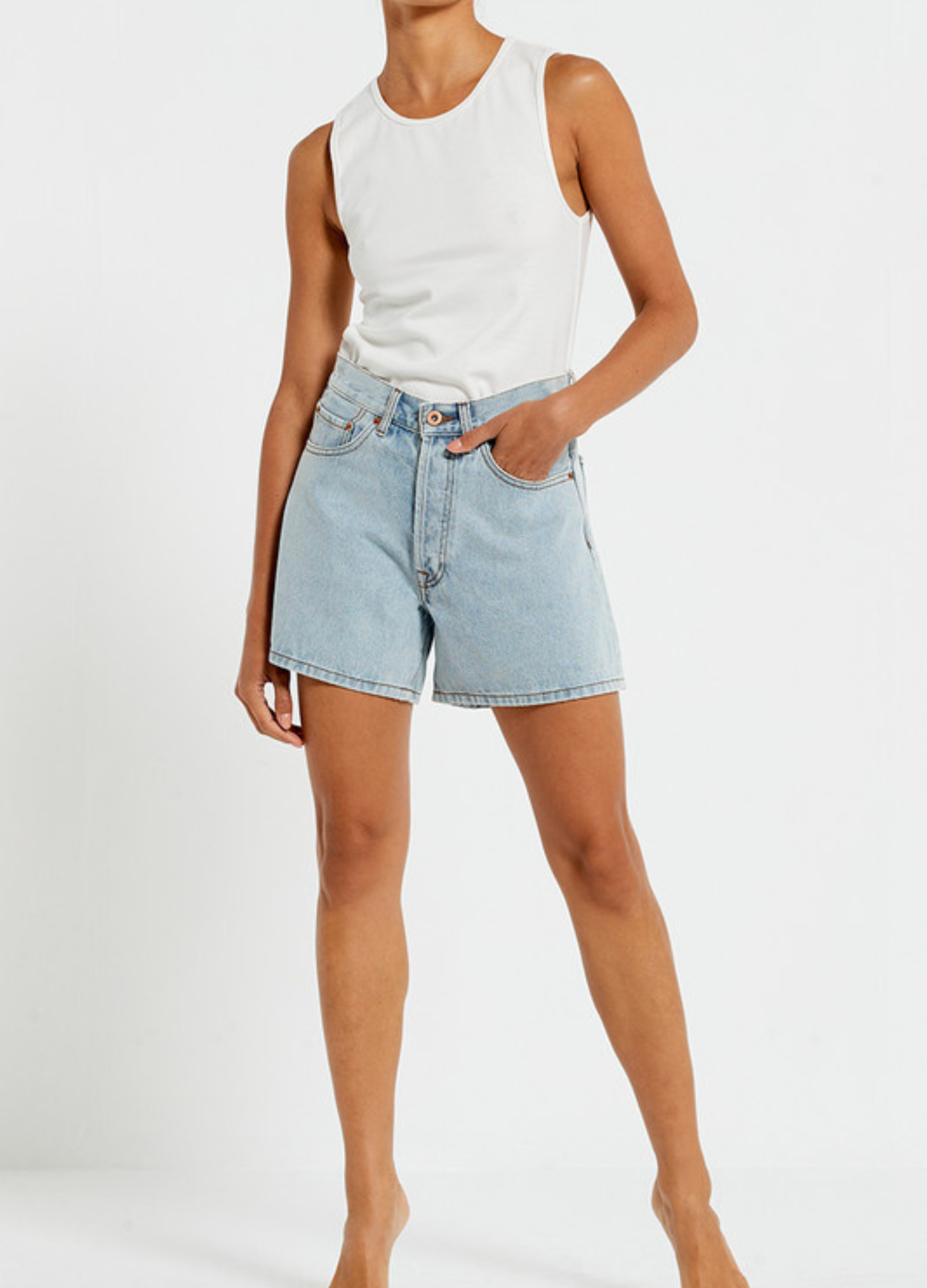 Model wearing the Bohemian Traders Mid Thigh ice wash short