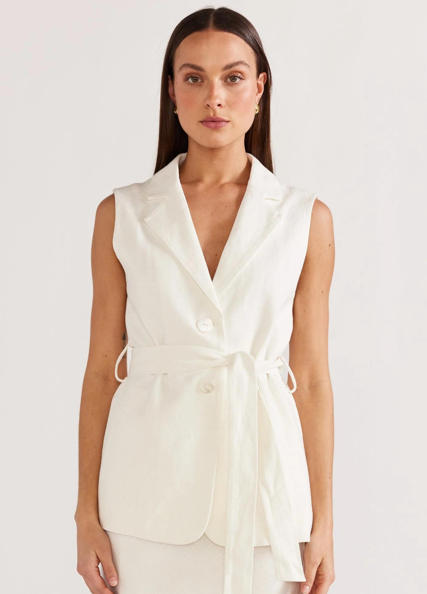 Sleeveless button up white blazer from Staple the Label