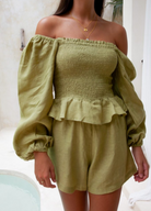 Moss green sustainable linen playsuit from Palm Collective