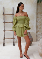 Moss green sustainable linen playsuit from Palm Collective