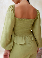 Moss green sustainable linen playsuit from Palm Collective