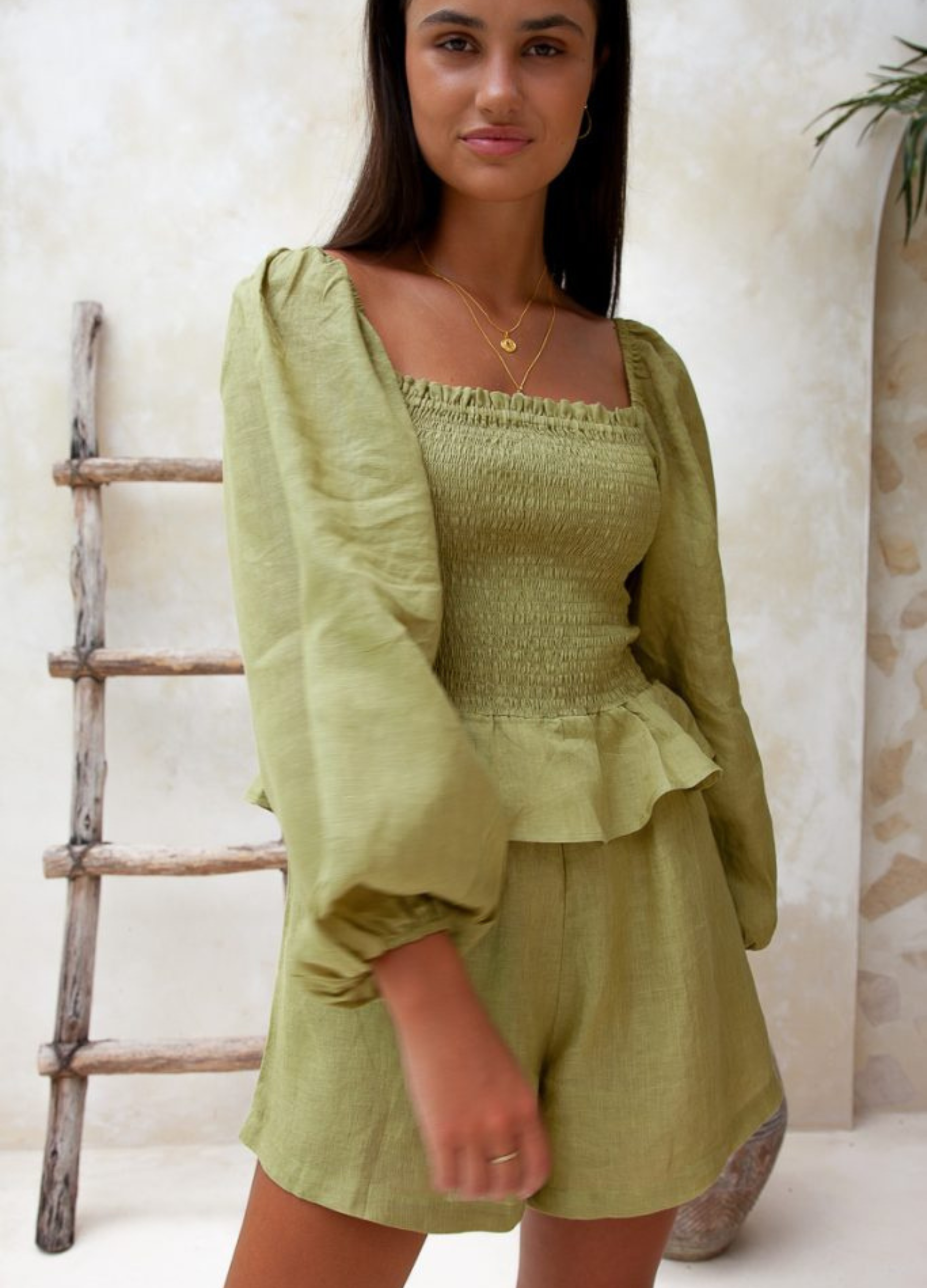 Moss green sustainable linen playsuit from Palm Collective