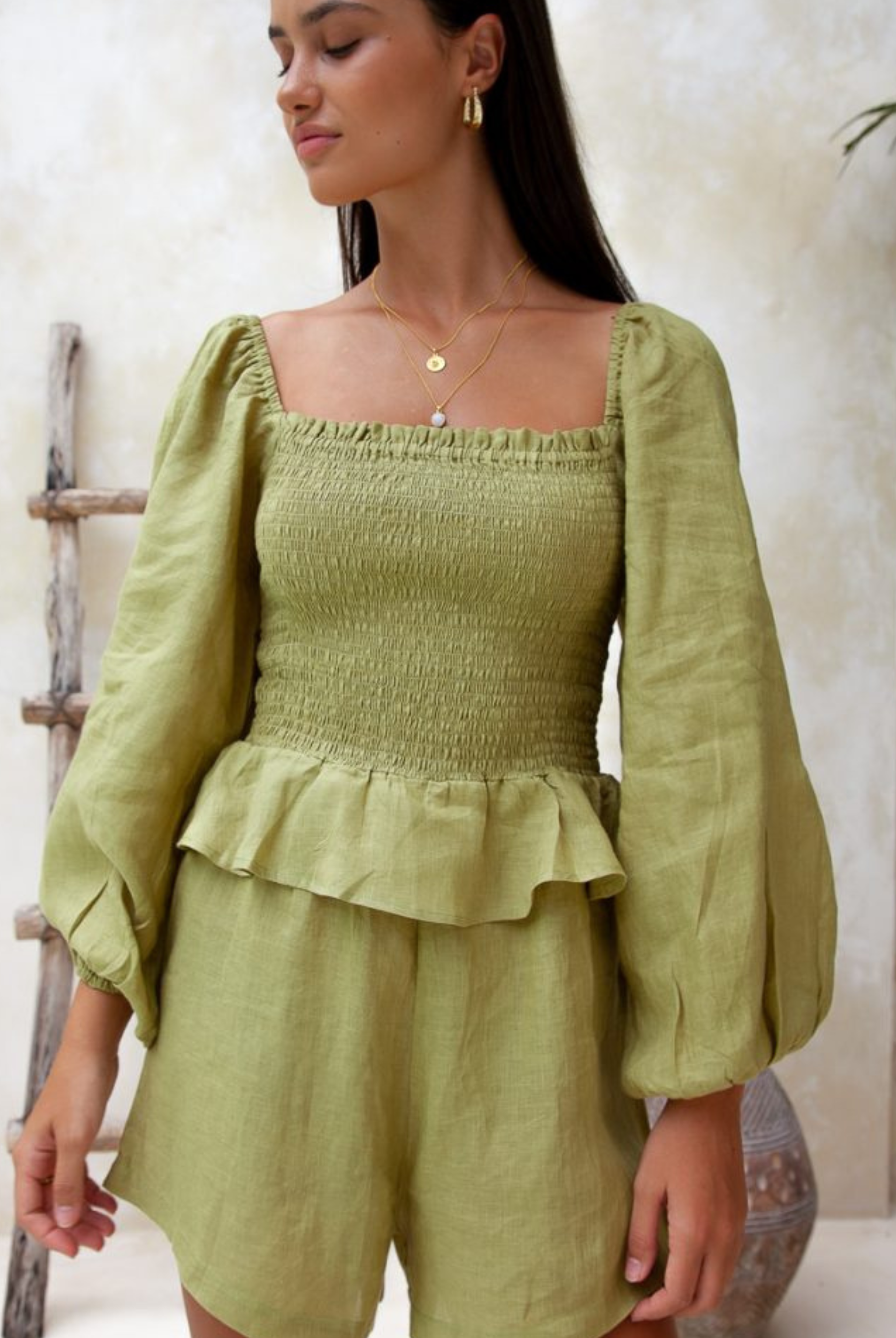 Moss green sustainable linen playsuit from Palm Collective