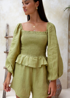 Moss green sustainable linen playsuit from Palm Collective