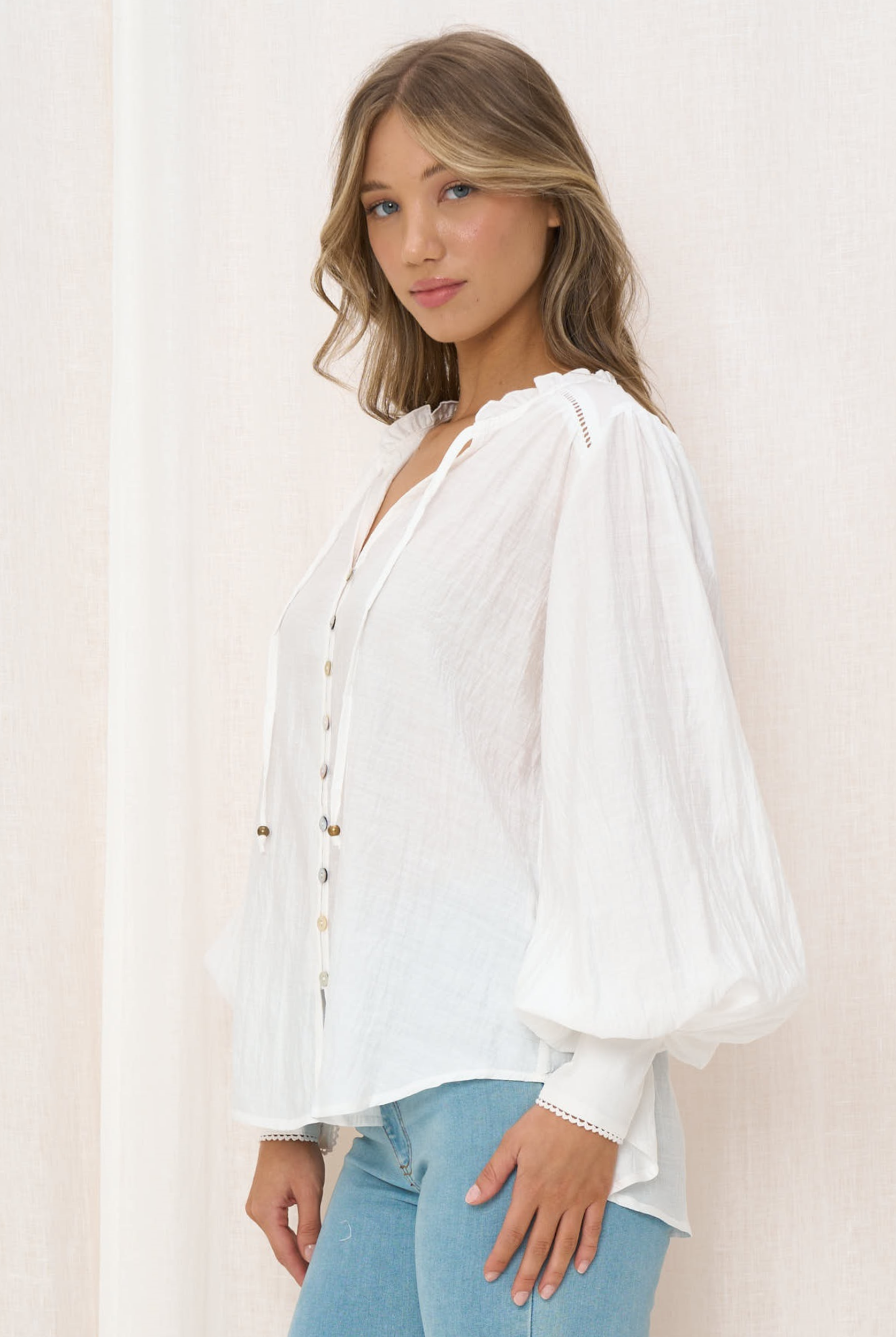 White blouse with button front and blouson sleeve
