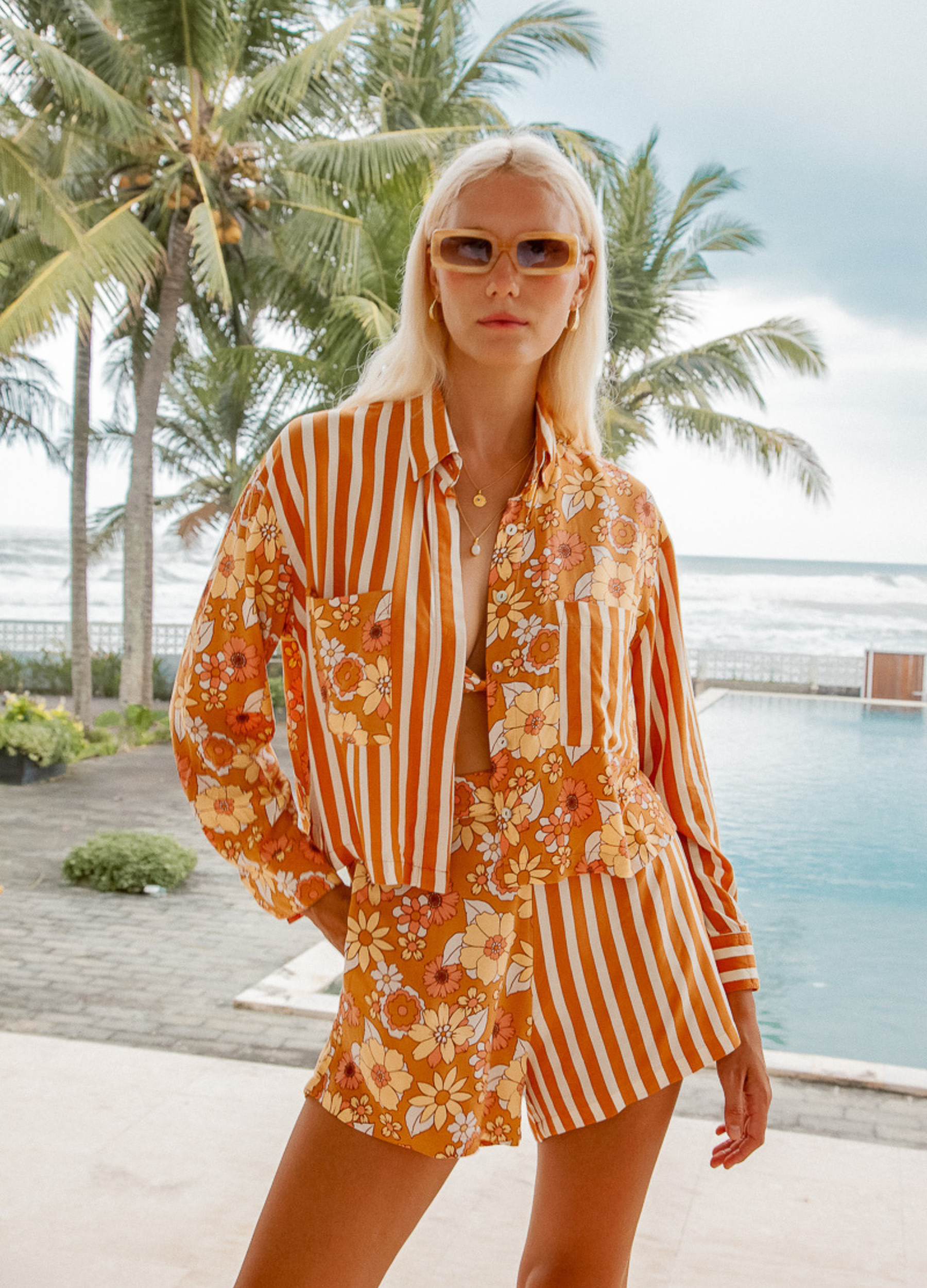 Model wearing the Sunshine Blouse from Palm Collective