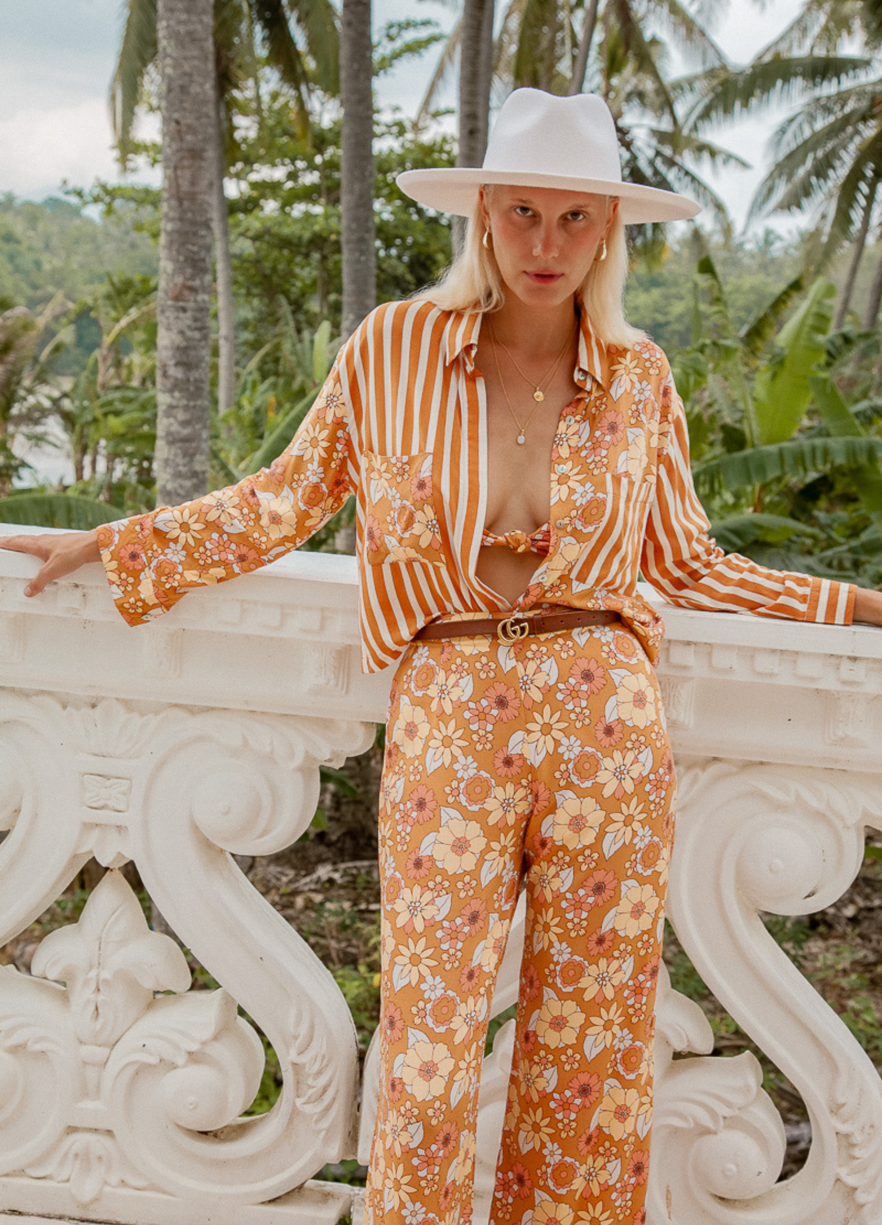 Model wearing the Sunshine Blouse from Palm Collective