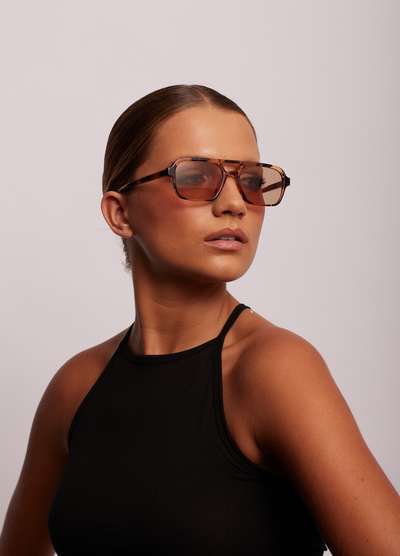 Model wearing the tomorrowland sunglasses is honey turtle