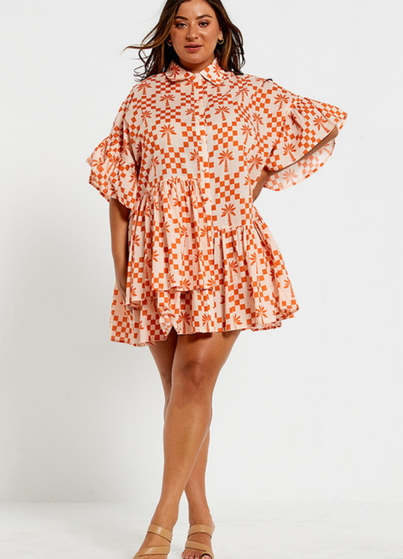 Model wearing the Bohemian Traders Genoa Dress in Palm Check Print