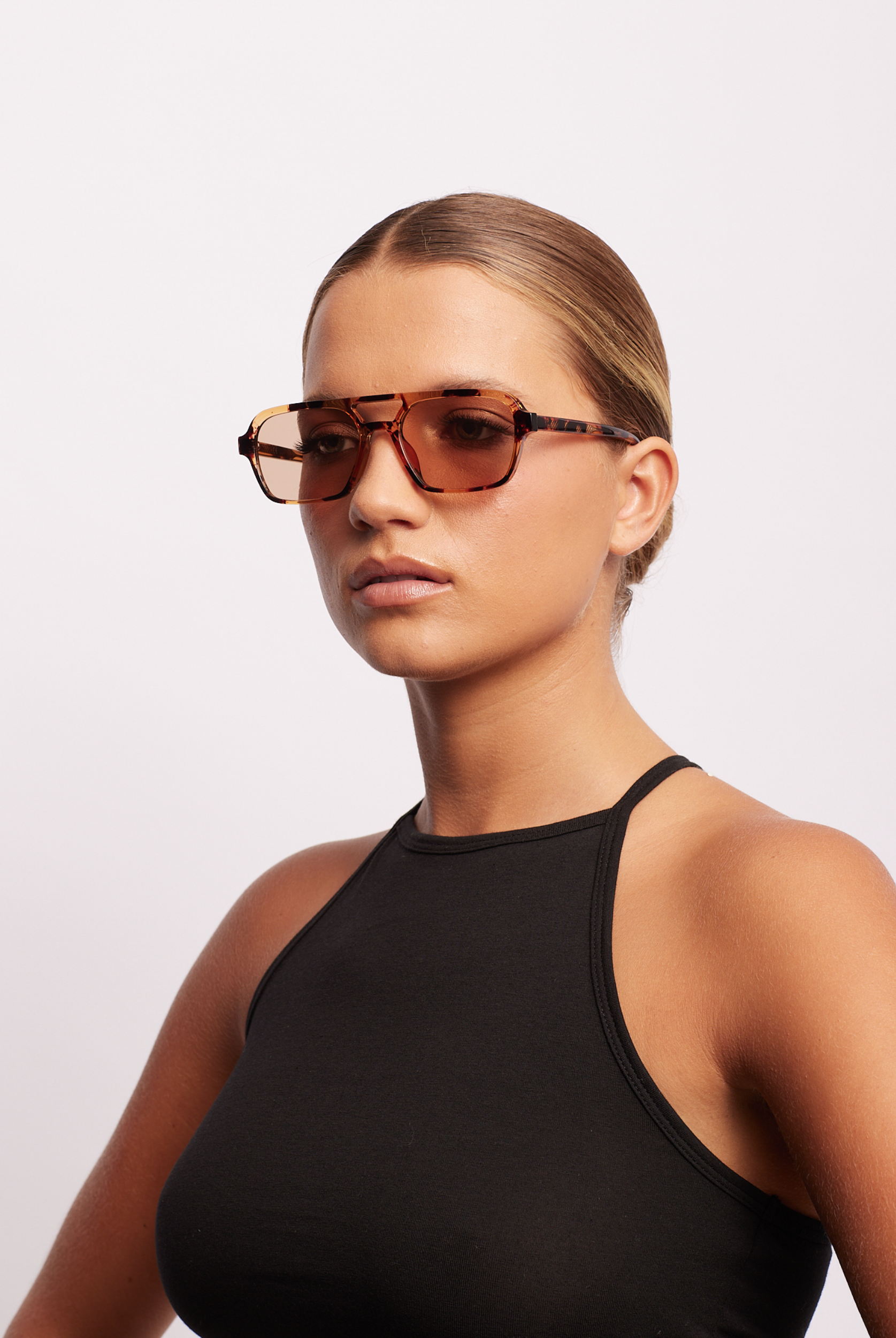 Model wearing the tomorrowland sunglasses is honey turtle