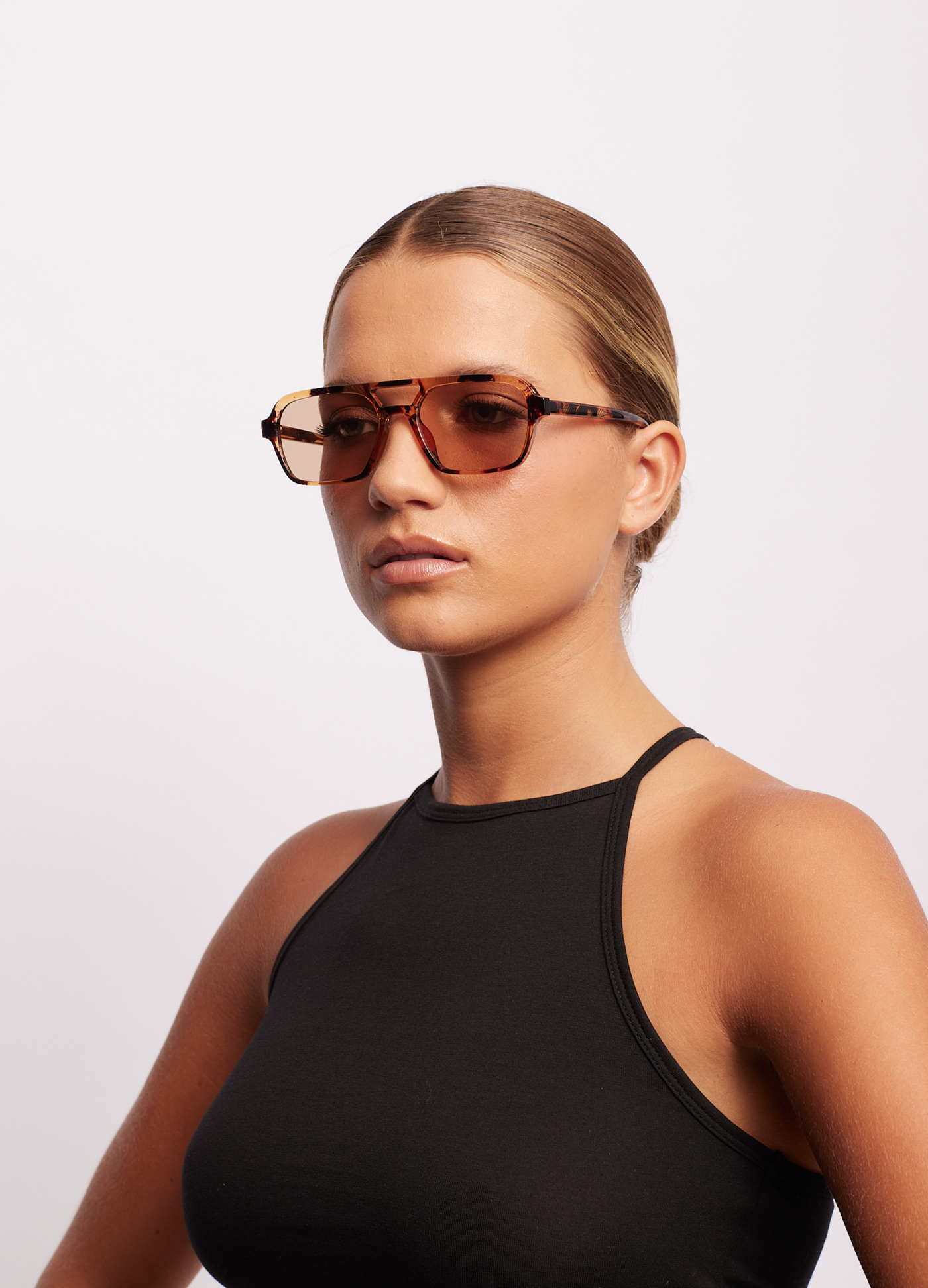 Model wearing the tomorrowland sunglasses is honey turtle